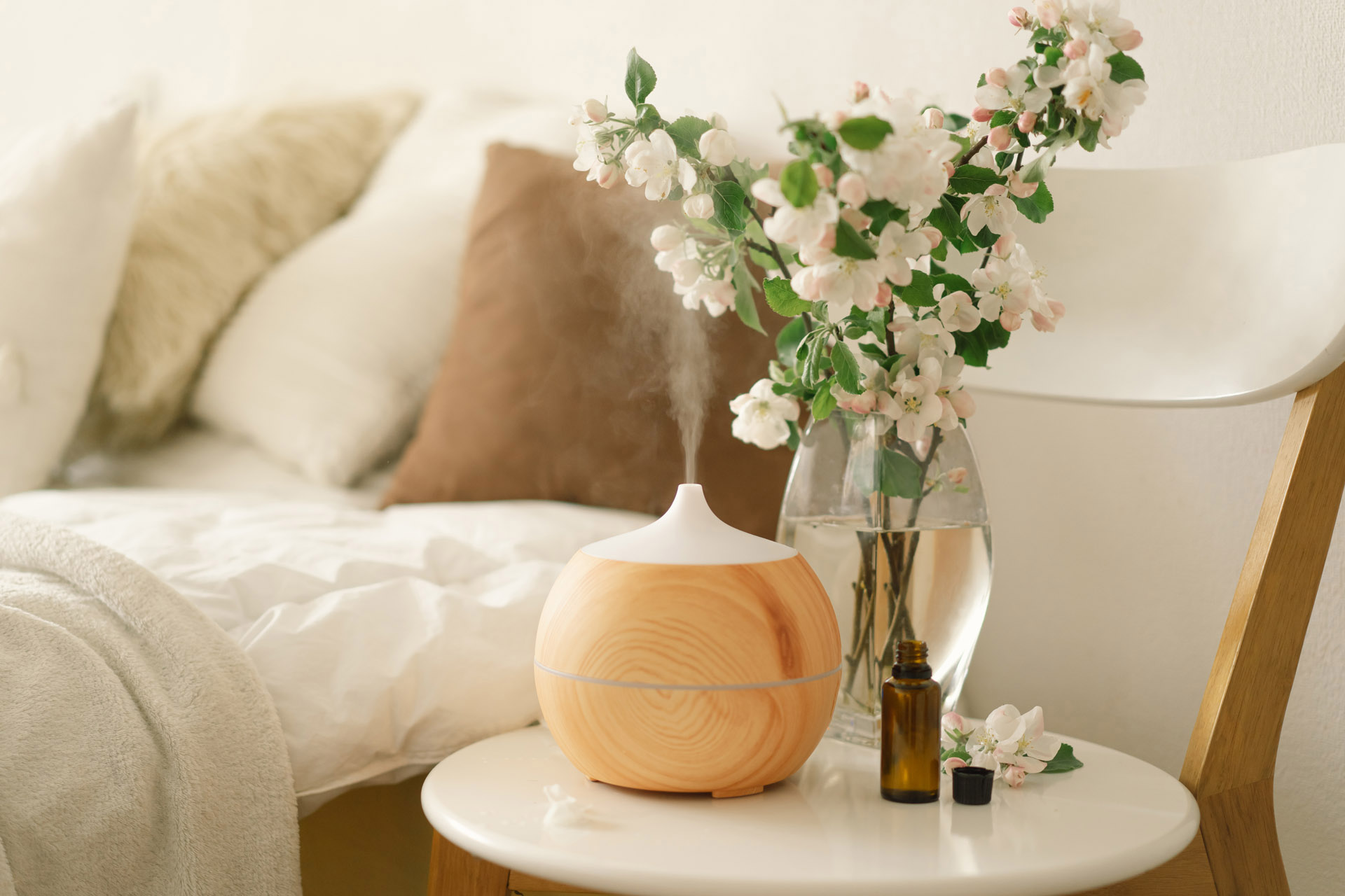 aromatic oil diffuser on a bedside table