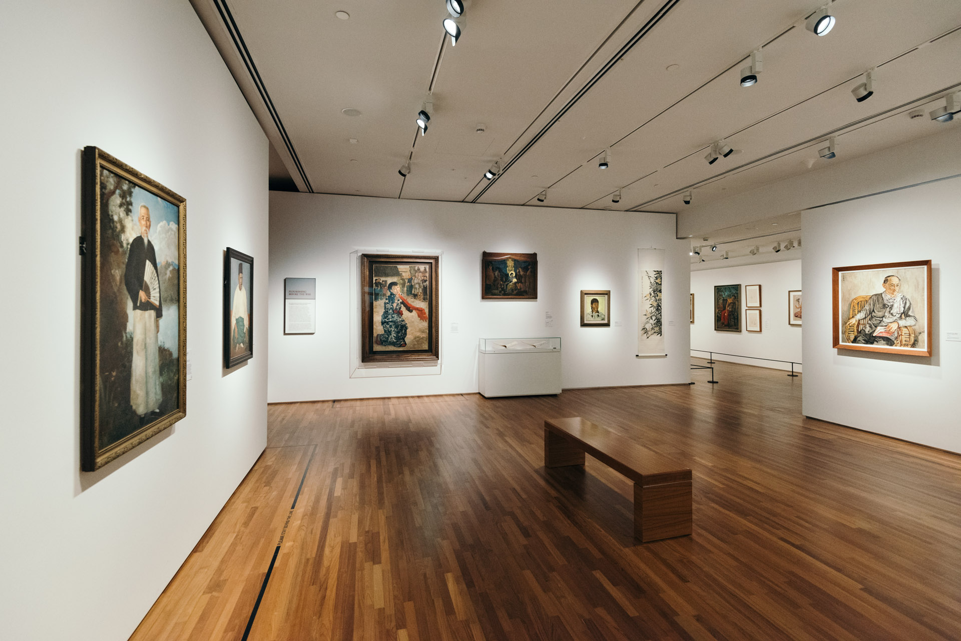 art gallery space with a wooden floor