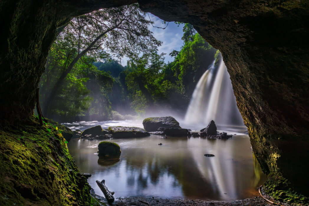 view of heo suwat waterfall from a cave